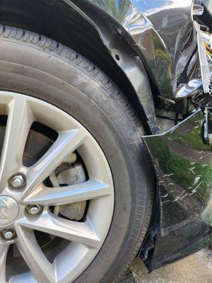 Rubbing the tire. Look at that deer hair! :(