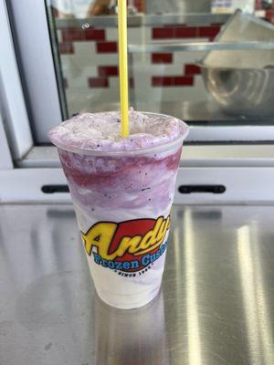 Large Vanilla Custard with blueberries, strawberries, crushed nuts, and pineapples