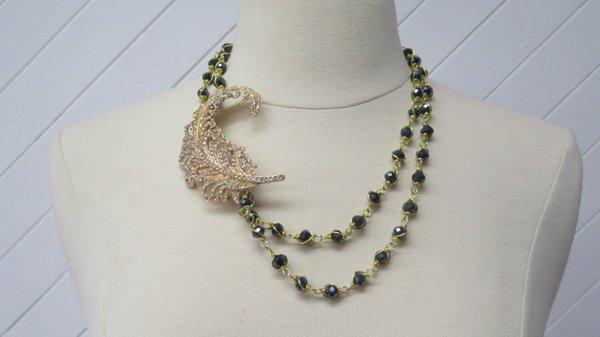 Stylish Feather Necklace. www.nesycollection.com