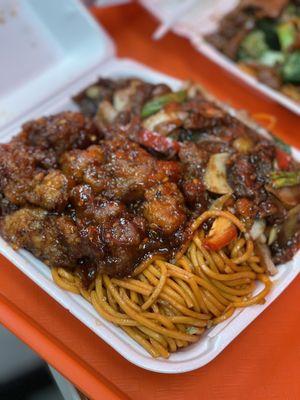 Half noodles. Half rice. Spicy tangerine orange chicken and Mongolian beef   @dangit.all