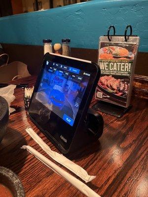 Tabletop kiosk to order and play games