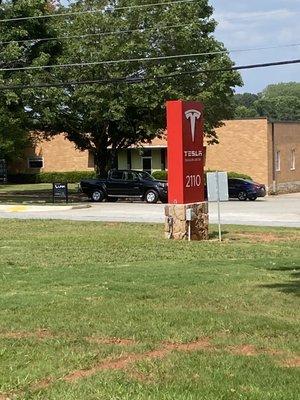 Sign out front of the new Collision center location