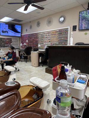 Nail station and big TV.