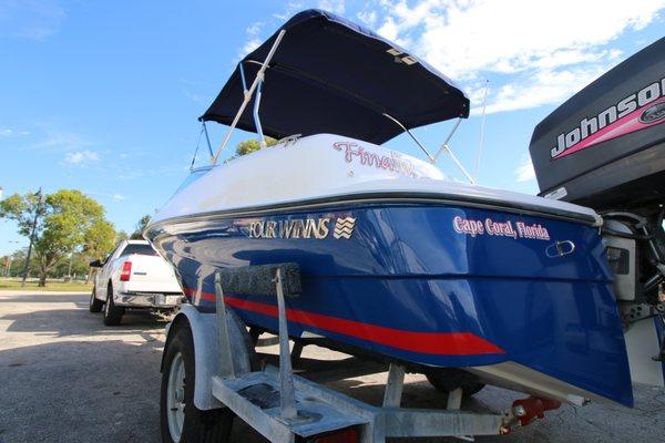 Four Winns after a new sapphire blue complete paint job, striping and boat name graphics!!
 #BoatPainting