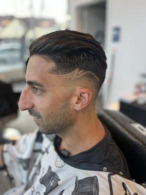 Mid drop skin fade with design, cut by Soni