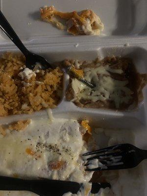 Large screw found baked into a cheese enchilada