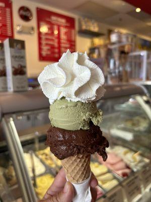 Dark chocolate and pistachio gelato with in house made whipped cream!