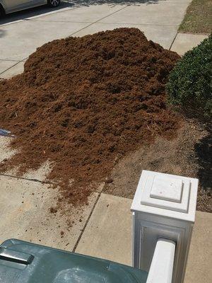 Lovely, stinky, triple shred mulch delivered same-day!