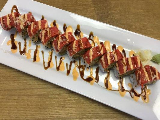 Monster Roll ($15)- shrimp tempura, eel, cucumber topped with spicy tuna, spicy mayo, eel sauce and crunchy flakes