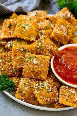 10 Pieces) fried ravioli cook nice golden and brown server with homemade marinara sauce or ranch dressing.