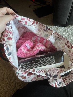 free bag, blanket, beanie and diapers