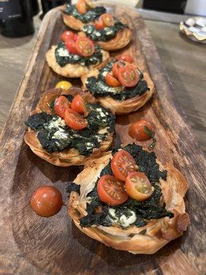 Phillo dough basket, spinach , goat cheese, cherr tomatoes