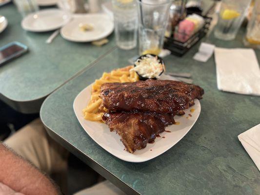 Most generous serving of delicious ribs "best ribs I've had in along time" rates 10/10 on yummy scale!