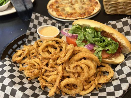 Turkey sub, and onion straws