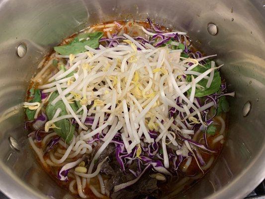 Bun bo hue stewing in my pot!