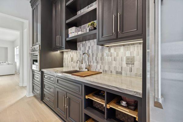 This Classic Kitchen in Rancho Santa Fe features Quartzite countertops, along with premium painted face frame cabinetry inset cabinet doors.