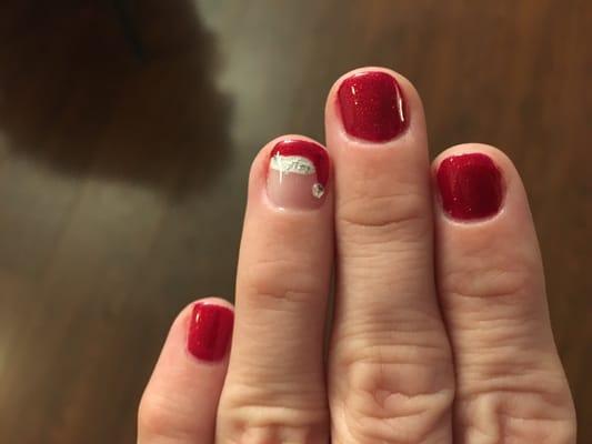 Nina did an excellent job with my (very short!) Chrismtasy nails! I love them!!