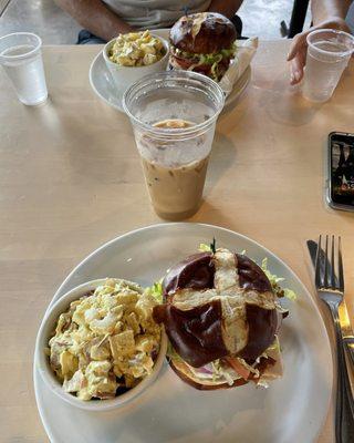 Turkey pretzel bun sandwich & iced latte