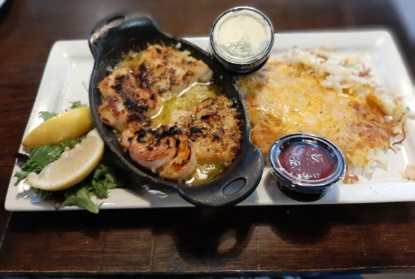 Baked Seafood combo with hashbrowns