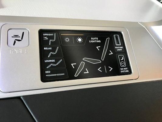 Business class computer that adjusts the seat