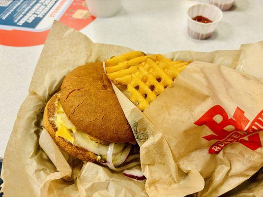 Original cheese burger and waffle, parmesan, and truffle fries.