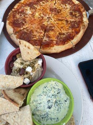 Warm Pita bread with hummus spinach dip and cheesy pepperoni pizza!!!!!!!soooo yummy