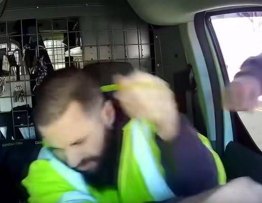 Meriden police Corporal Allen Ganter punching the motorist, Thomas Brocuglio, in the face through his driver's side window