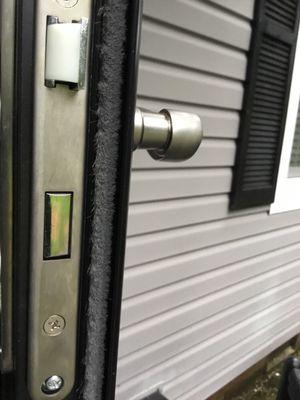 Storm door side, including lock.