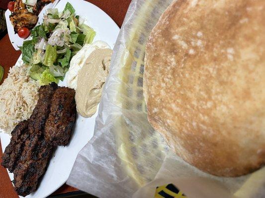 Warm pita comes with Lamb Kofta Platter