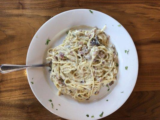 Carbonara with a cute decorative dish.