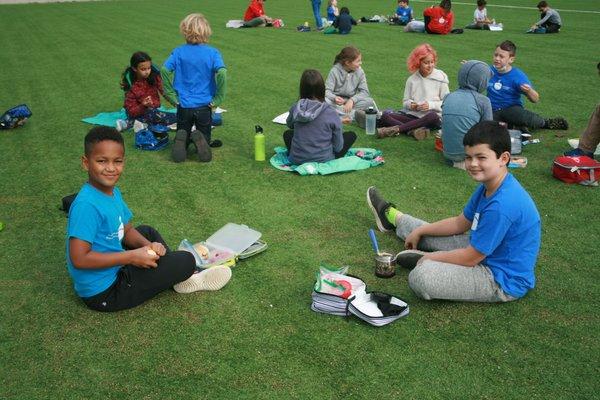 Picnic on the field for our community day, the journée verte