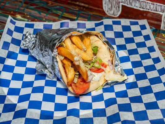 Veggie Gyro -- for those light vegetable full bites!

Vegetarian ; can be made vegan (sauces)