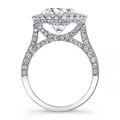 Hand-pave diamonds under french prong diamond halo