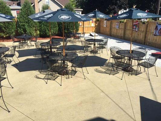 Outdoor patio and bags court.