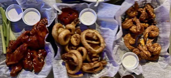 Wings, all flats, bipi, retossed in honey siracha! Onion rings with ranch, Boom, Boom Shrimp!