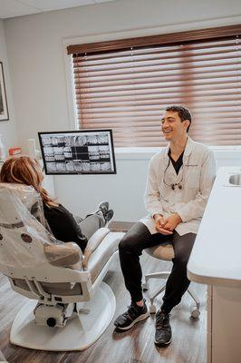 Sparks dentist Dr. Michael Kanellis explaining dental crown options at Kanellis Family Dentistry