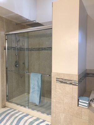 The new custom built wall to extend the shower & add a bench seat. Complete shower remodel.