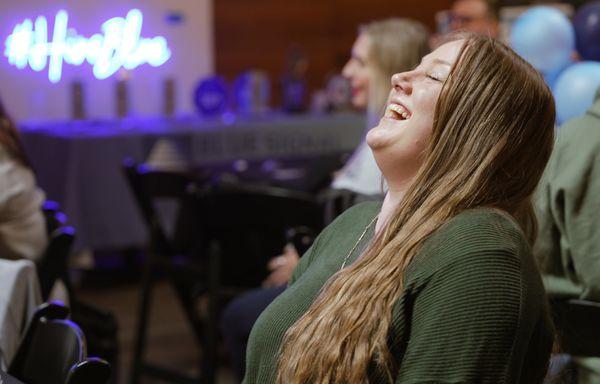 Blue Signal Search 2023 Summit: Employees enjoying the laughing yoga segment.