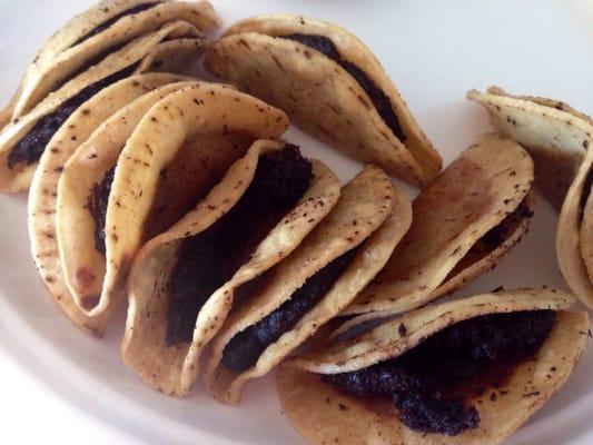 Mini tacos, burned to a blackened crisp.