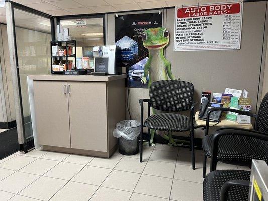 Waiting area with free water and coffee.