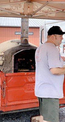 Firing up the pizza oven. I love watching the flames as the pizza is being cooked to perfection!