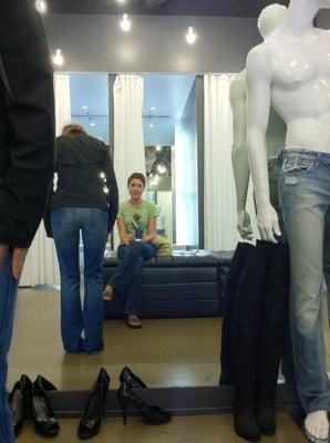 Watching my sister try on jeans. Just hanging out enjoying the music!