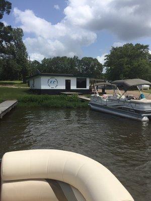 Boat parking in front of the marina store.