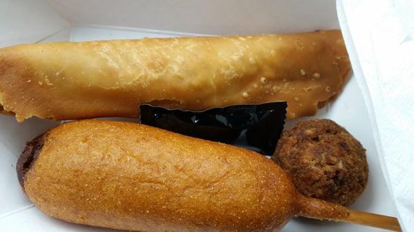 Crispito, boudin ball, and corn dog.