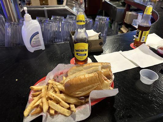 Chicken Parmesan sandwich with a side of fries