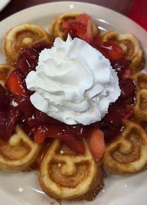 Belgian waffle with strawberry topping.