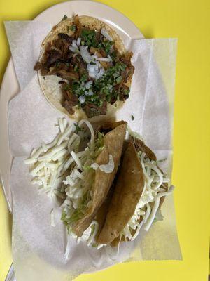 Tacos dorados chicken and al pastor taco