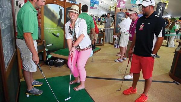 FanFest at the Colonial tournament is a great place to cool off in the A/C and get a bunch of free stuff.