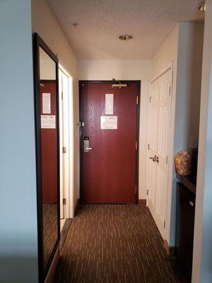 Room hall with gorgeous mirror. Huge plus. Large closet. Spacious refrigerator. Single cup coffee but no cups.