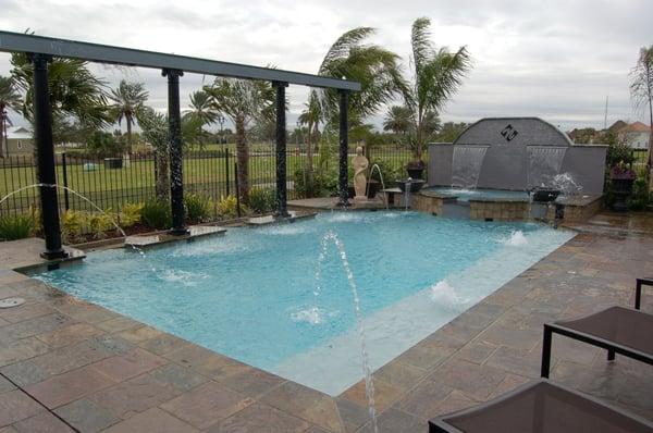 Beautiful custom swimming pool overlooking the golf course.